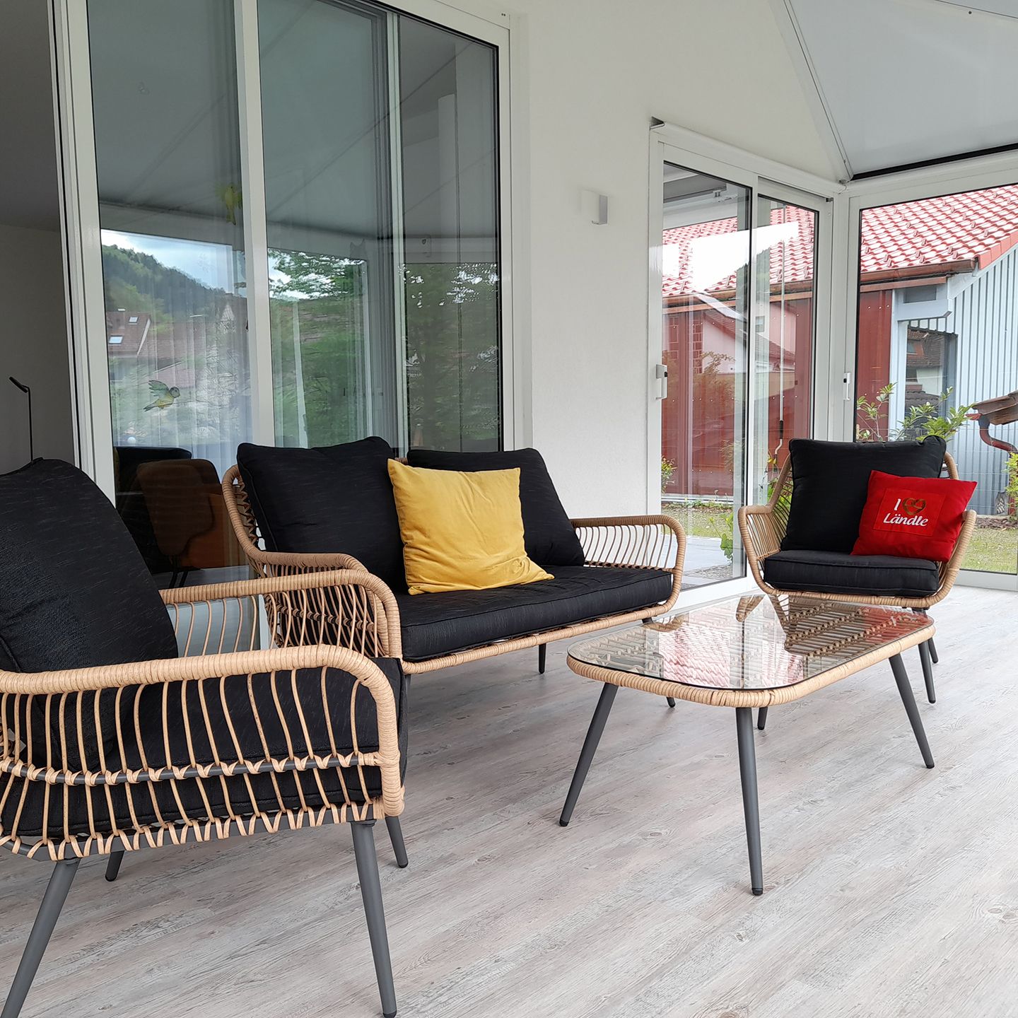 Seating in the holiday flat's conservatory